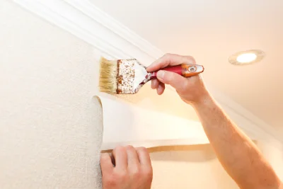 Pose de papier peint à Campouriez — revêtements muraux et toiles de verre